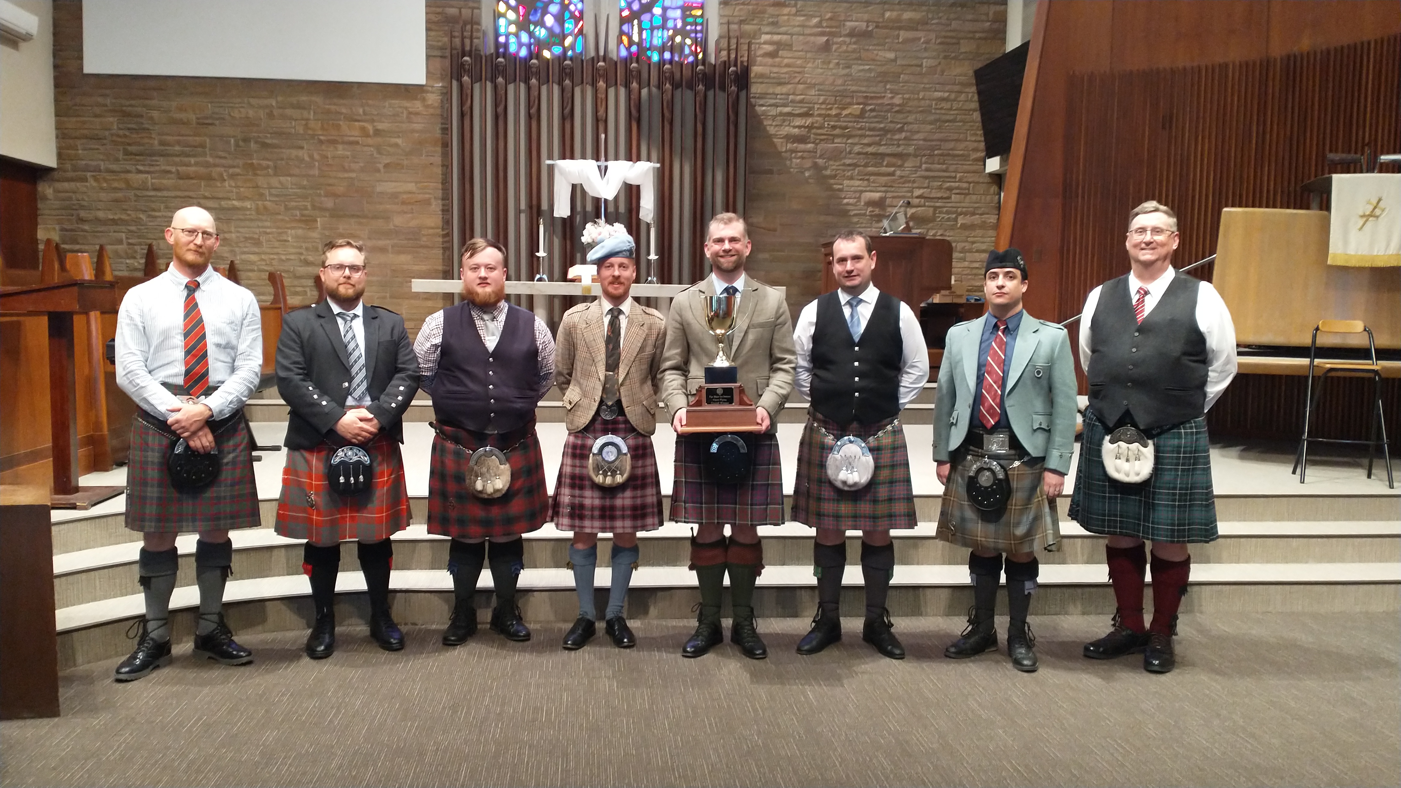 pictured (from left): Justin Howland, Joe Biggs, Jack Williamson, Nick Hudson, Derek Midgley, Andrew Carlisle, Andrew Lewis, Scott McCawley